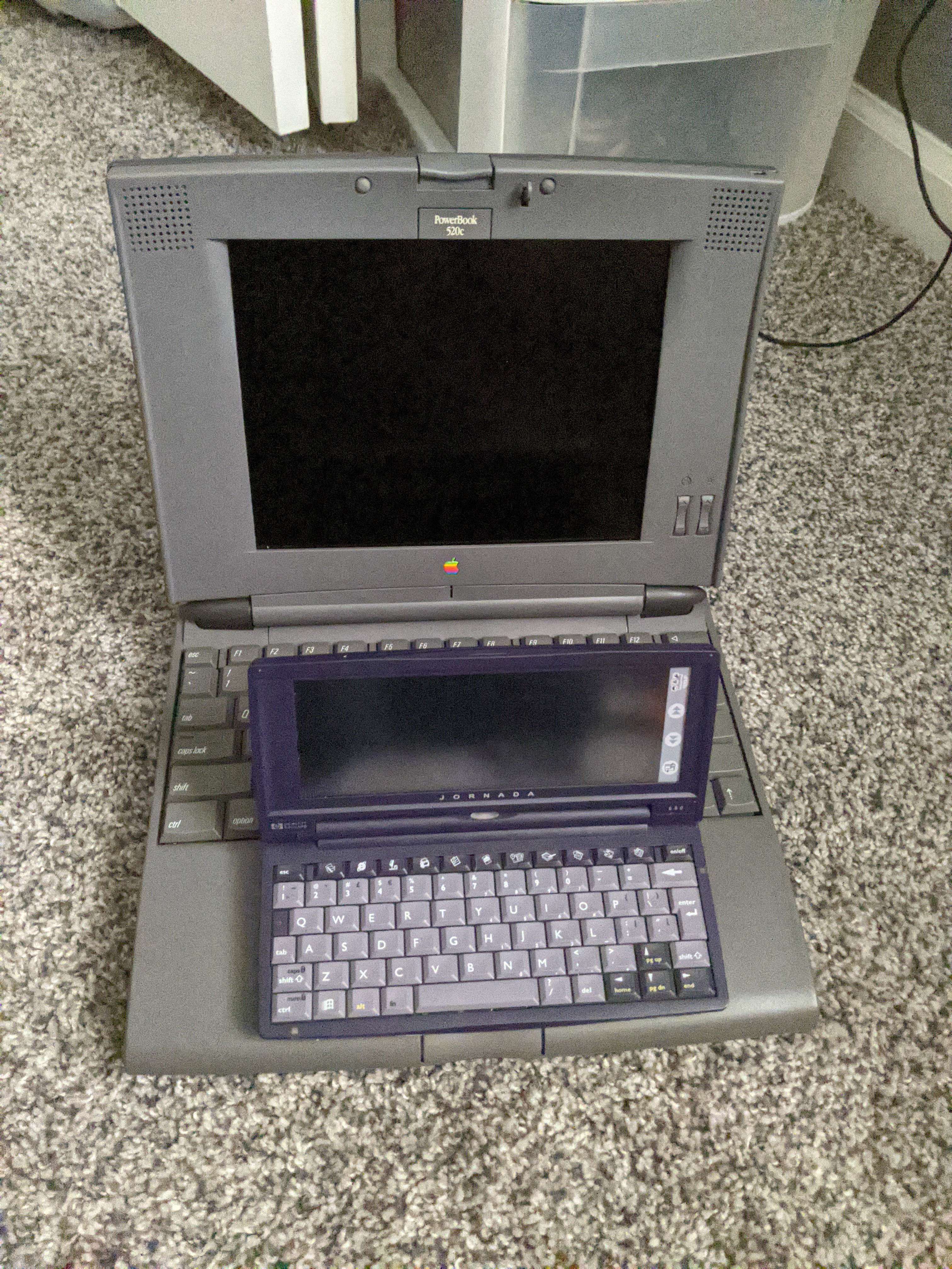 The HP Jornada 680, on top of a PowerBook 520c for scale